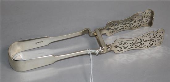 A pair of Victorian silver fiddle pattern asparagus servers, Francis Higgins II, London, 1853, 24.2cm.